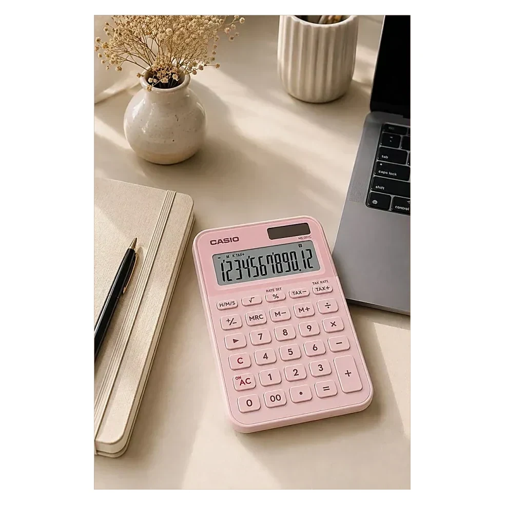 Pink Calculator on Desk
