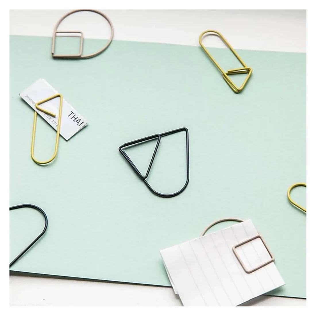 Gold Paper Clips on Mint