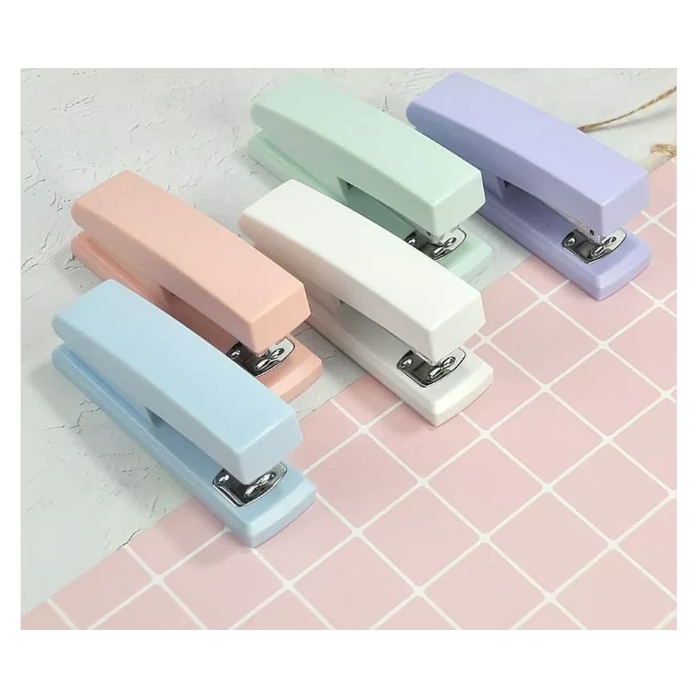 Pastel Staplers on Tile